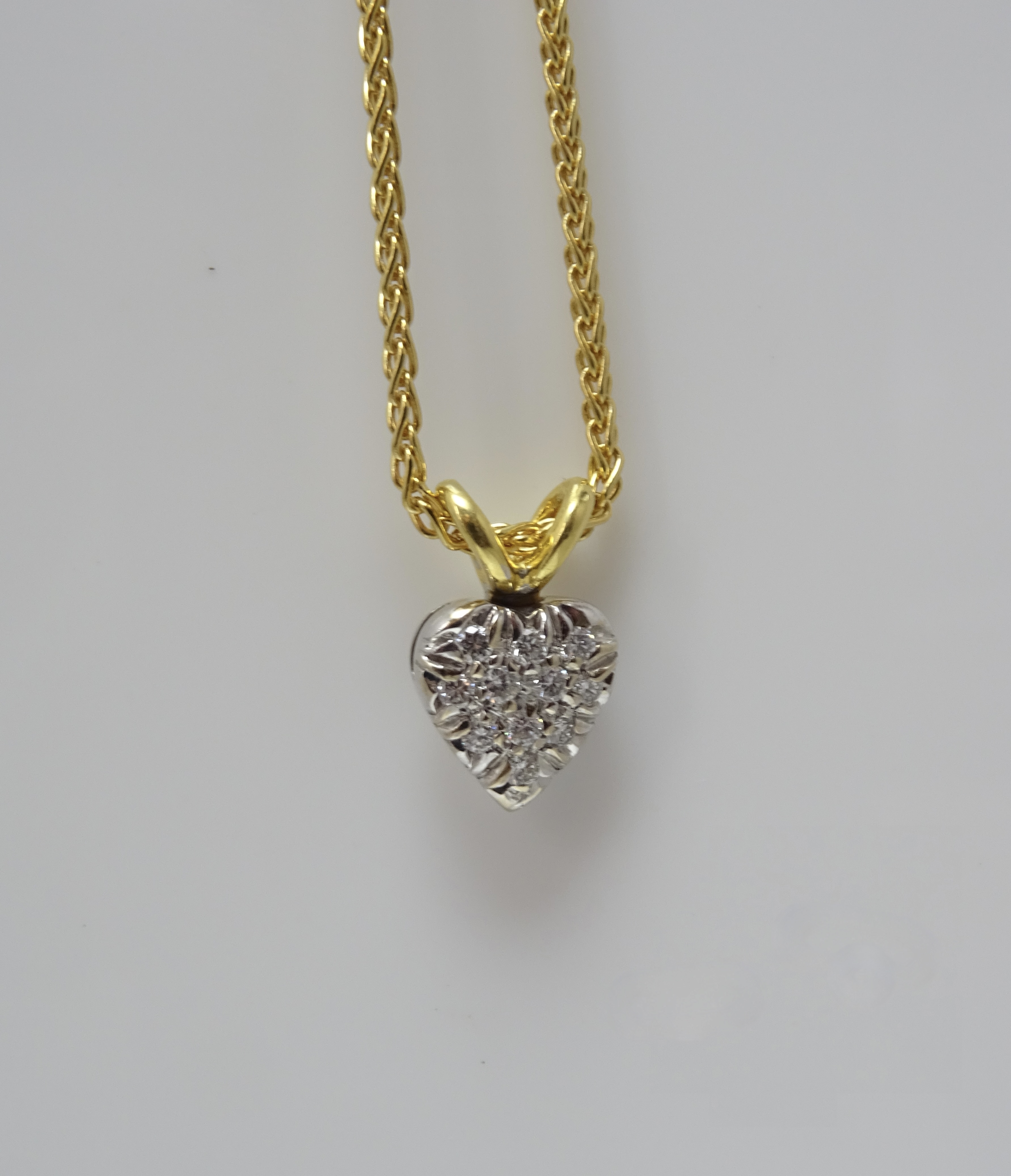 Collana in oro giallo con cuoricino di diamanti 0.22 ct